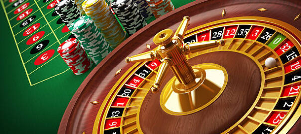 Roulette wheel and casino chips on the table.Similar images: